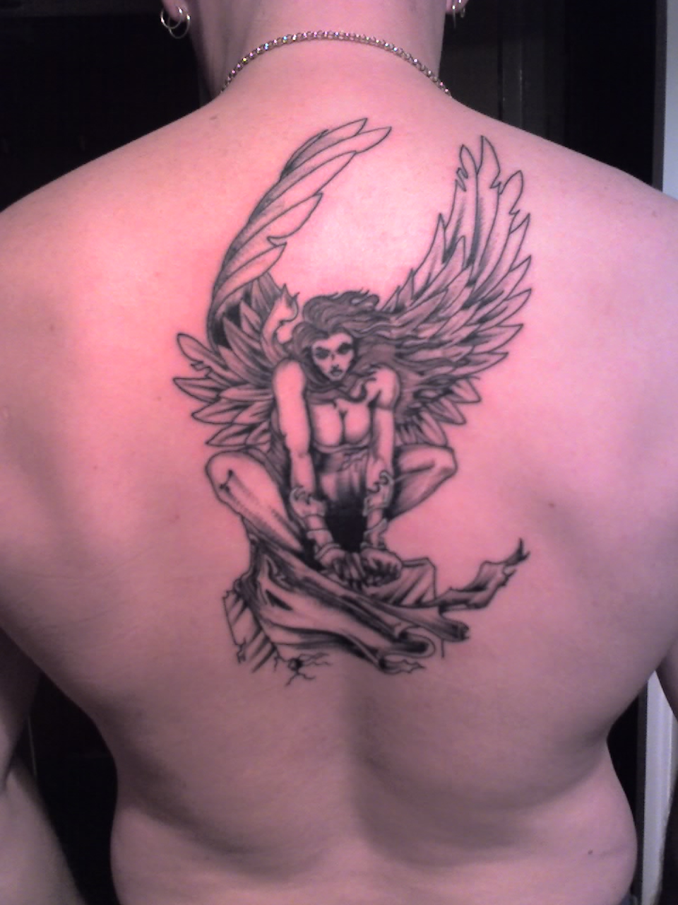angel devil tattoos manner