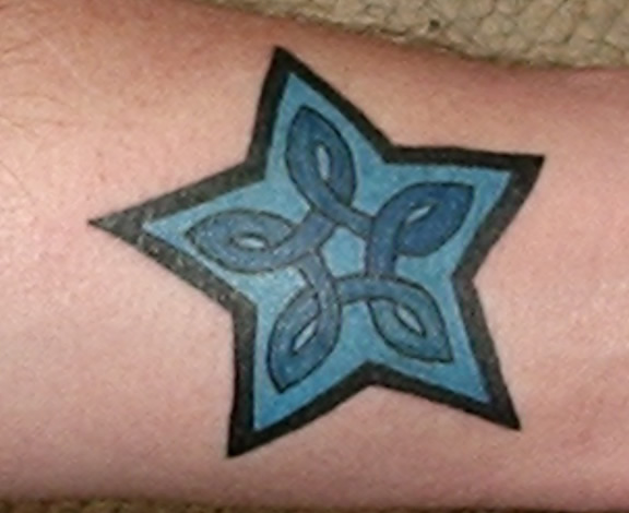 shooting stars tattoo. star tattoo