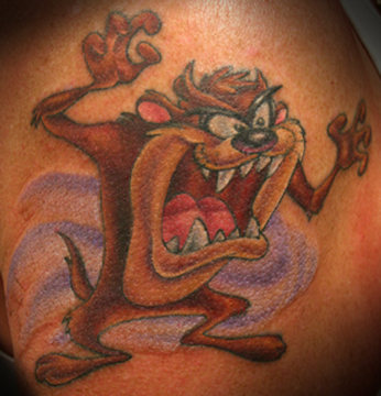 tattoo isn't just some random cartoon character, but a comic portrait of