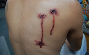 bullet hole tattoos