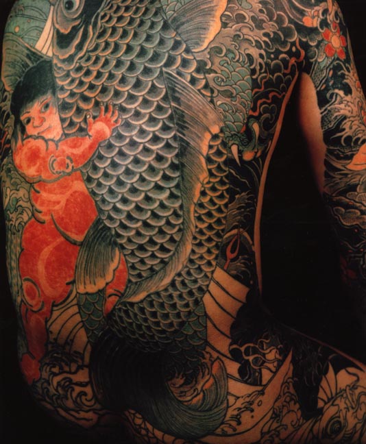 Japanese tattoos usually have koi fish and lots 