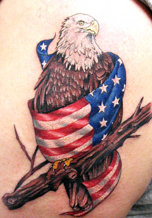 American flag and cross tattoo.