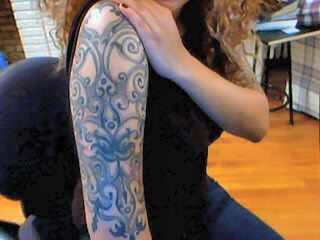 girly arm tattoo