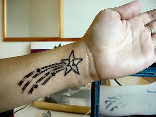 shooting star tattoo