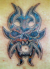 evil cat tribal tattoo